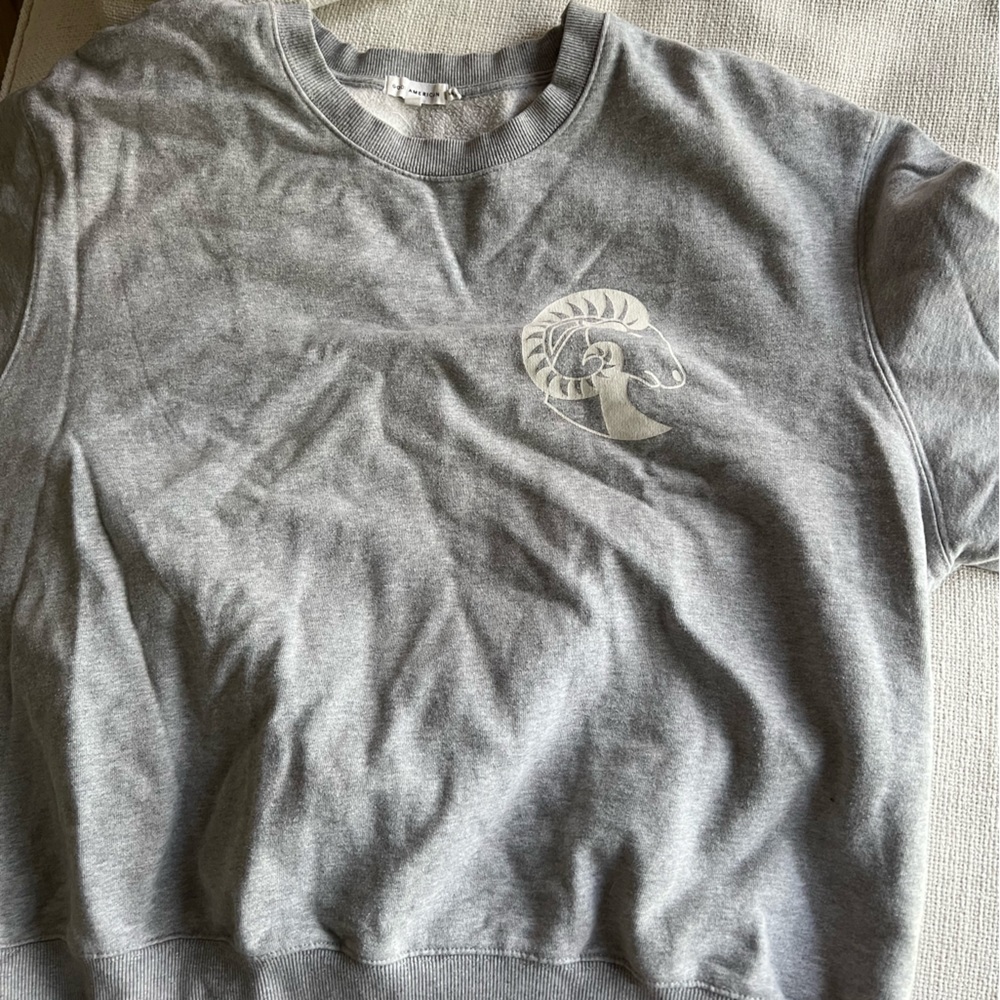 Soft sweater from Good American. Grey Aries